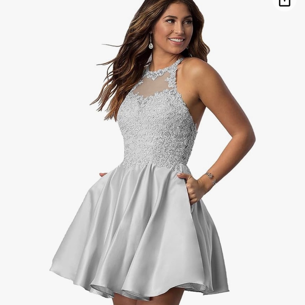 Silver halter dress perfect for homecoming or cocktail dinner. Worn once. Size 2